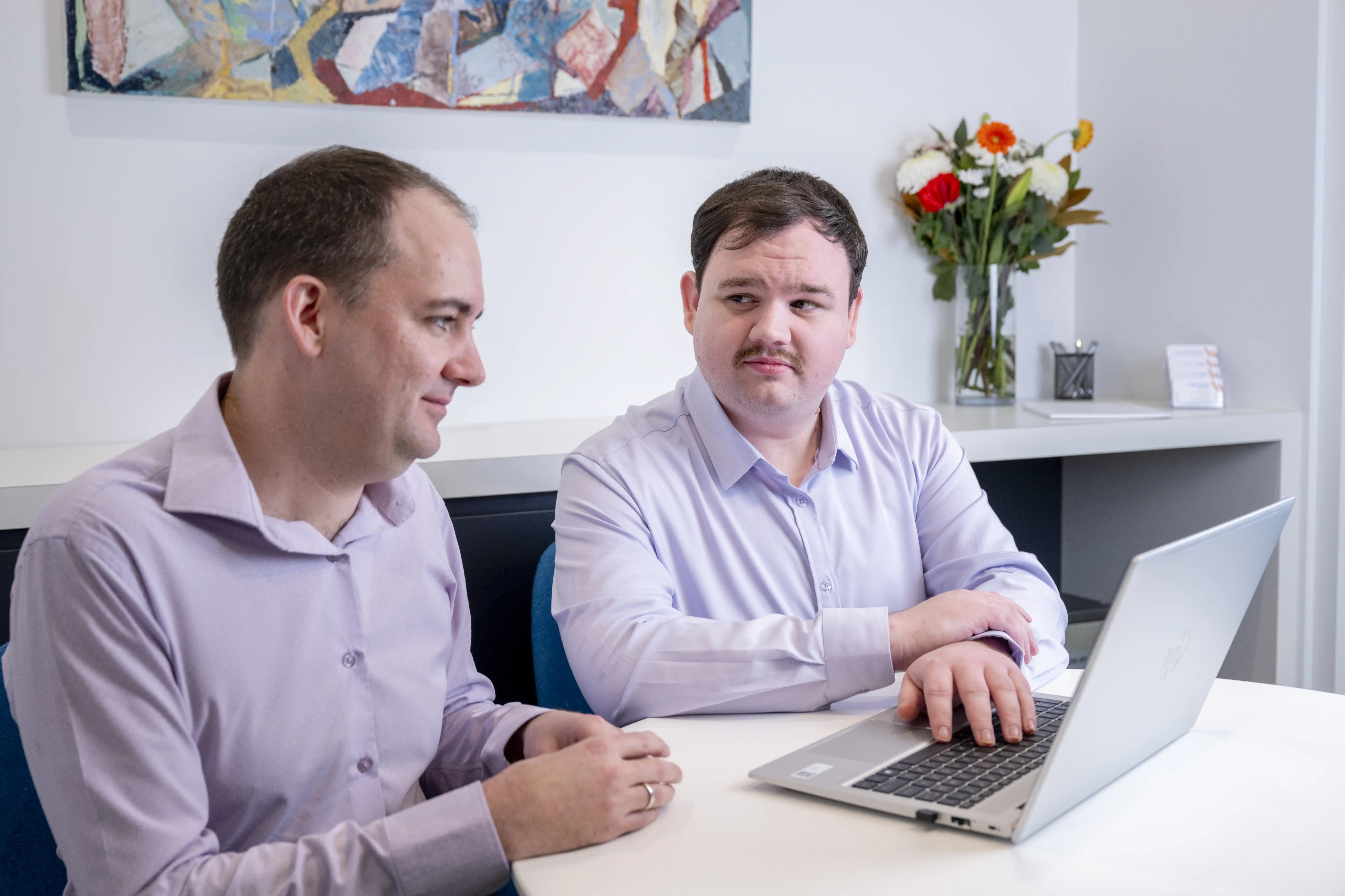 4Front adviser discussing wills and estate planning with a client