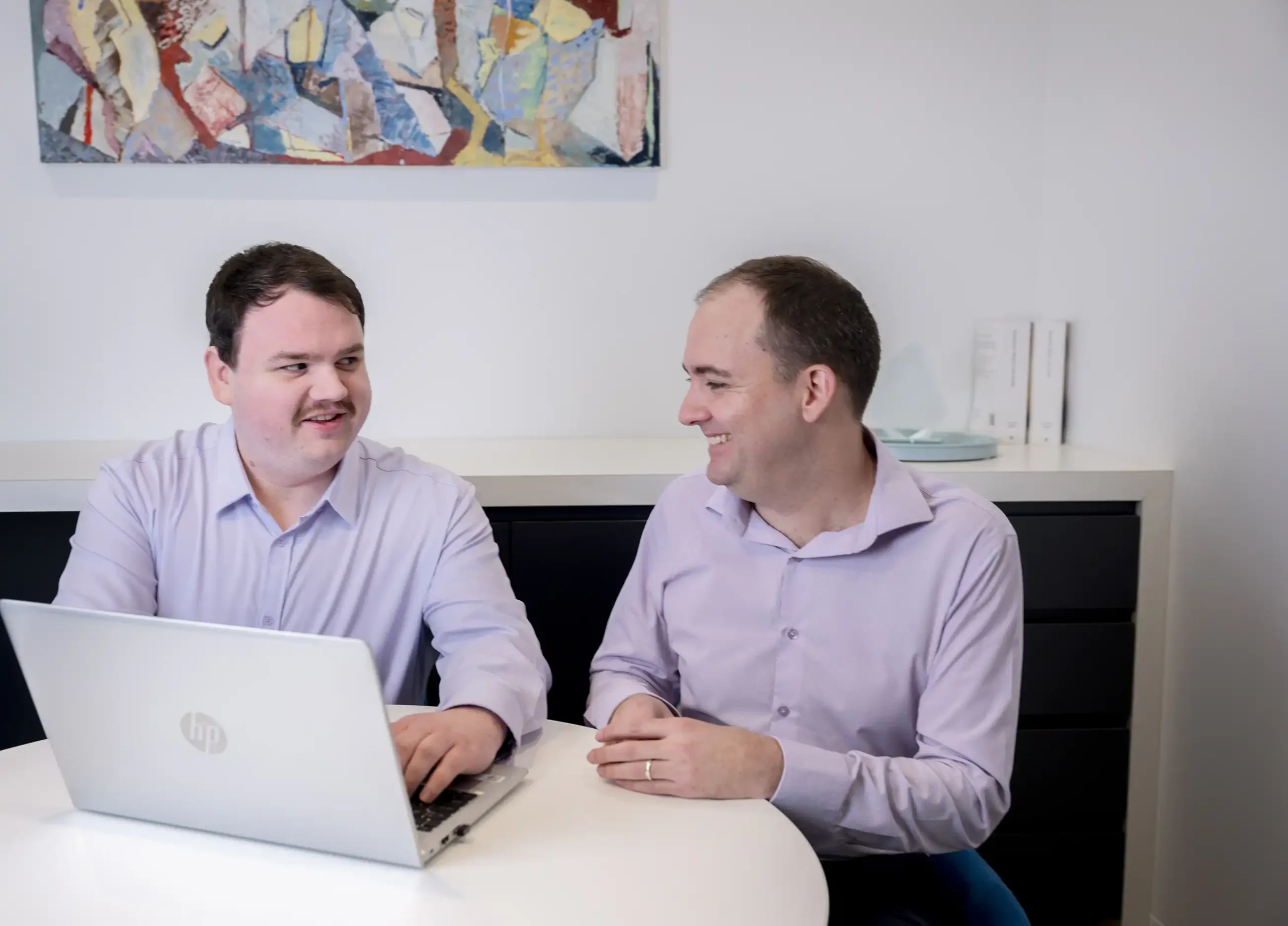 Private wealth advisor discussing asset and financial planning strategies
