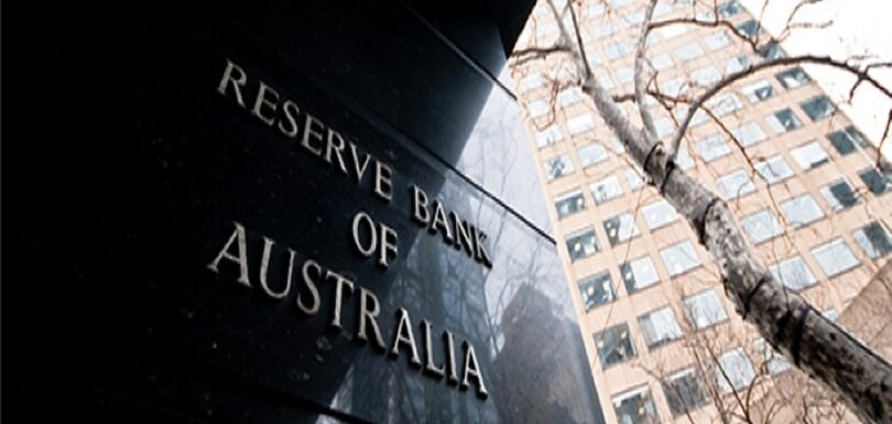 Finance broker reviewing home loan interest rates